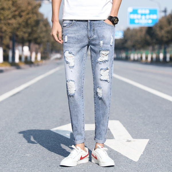 Μοντέρνα ανδρικά μακριά τζιν με σκισμένα μοτίβα