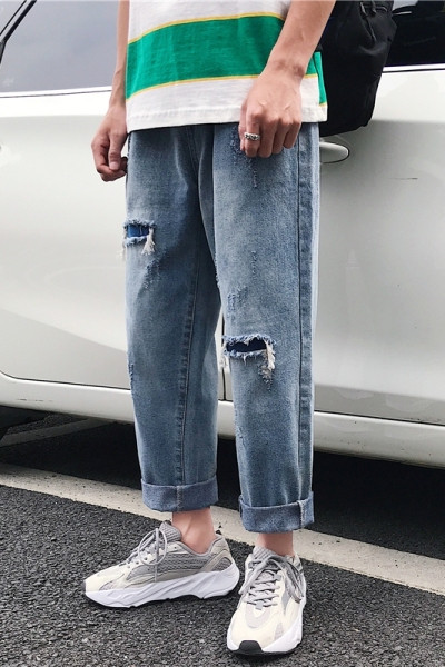 Νέο μοντέλο τζιν άνοιξης-καλοκαιριού με σκισμένα μοτίβα