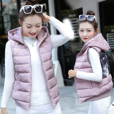 Igapäevane naiste lühike vest kapuutsiga ja aplikatsiooniga