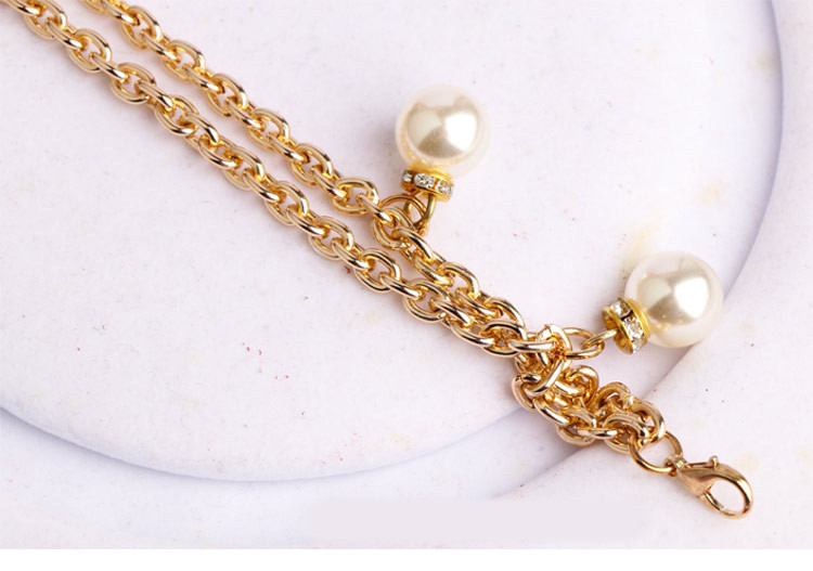 Kuldset värvi pärlite ja kivikestega naiste vöö