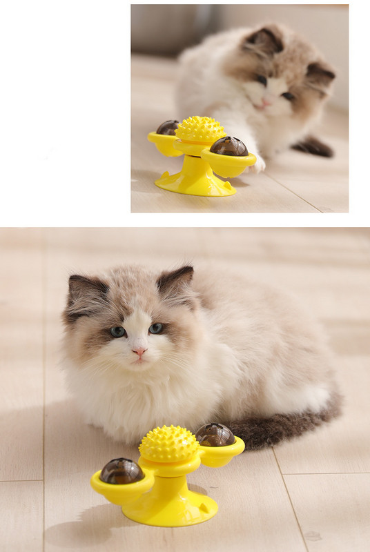 Πλαστικό περιστρεφόμενο παιχνίδι για μια γάτα