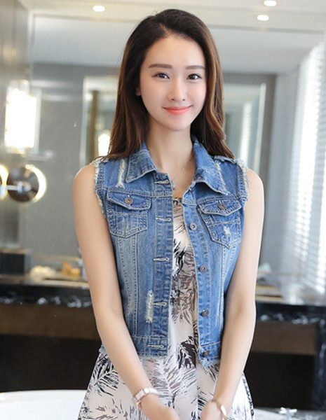 Γυναικείο γιλέκο κοντό τζιν με σκισμένα μοτίβα και τσέπες