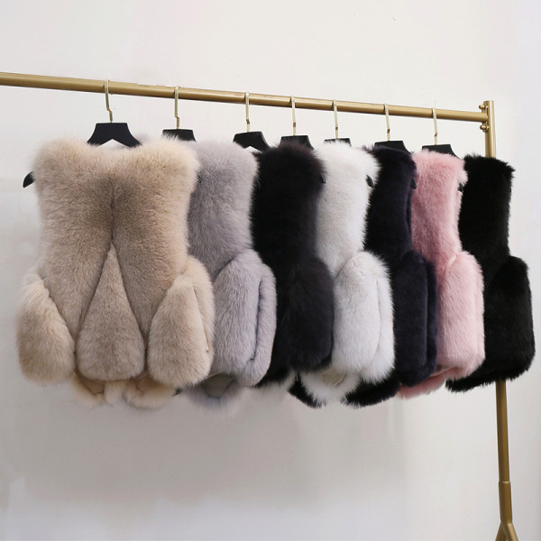 Stílusos női rövid hajmellény