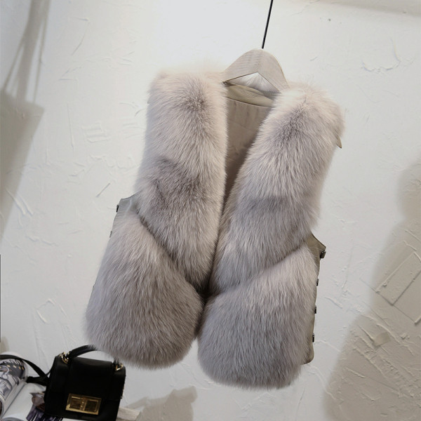 Κομψό γυναικείο κοντό γιλέκο με κουμπιά