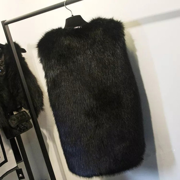 Eleganta sieviešu garā veste ar dūnām