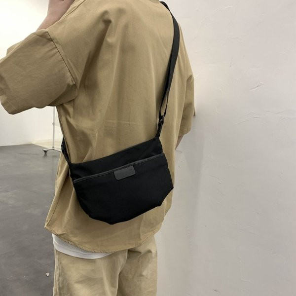 Moderna vīriešu tekstila soma ar garu rokturi