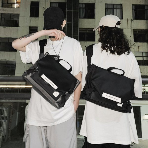 Sülearvutile sobiv pika sangaga veekindel meestekott