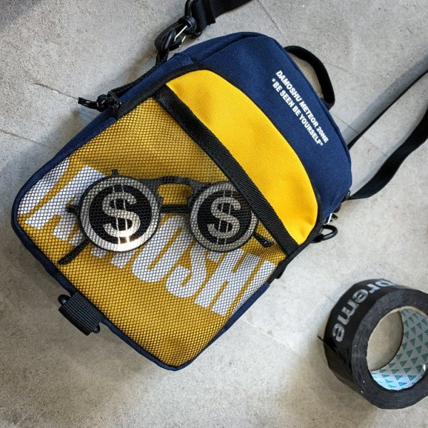 Ikdienas vīriešu soma ar garu rokturi un uzrakstu