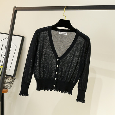 Γυναικεία ζακέτα νέου μοντέλου με κουμπιά και βαθύ ντεκολτέ