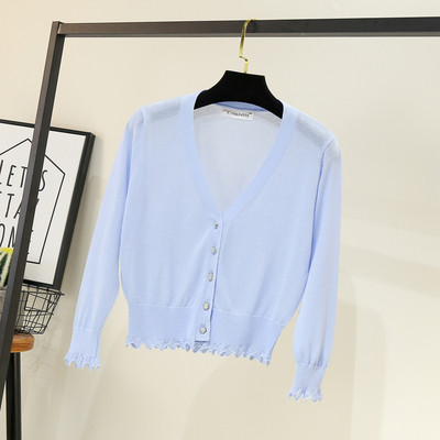 Γυναικεία ζακέτα νέου μοντέλου με κουμπιά και βαθύ ντεκολτέ