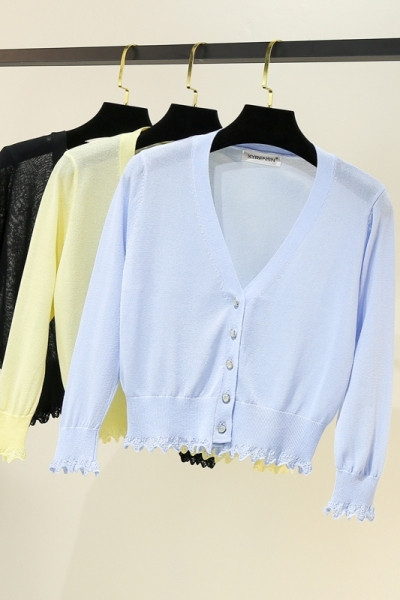 Γυναικεία ζακέτα νέου μοντέλου με κουμπιά και βαθύ ντεκολτέ