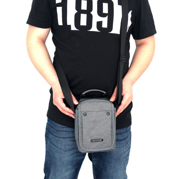 Moderna vīriešu soma ar tekstila rokturi