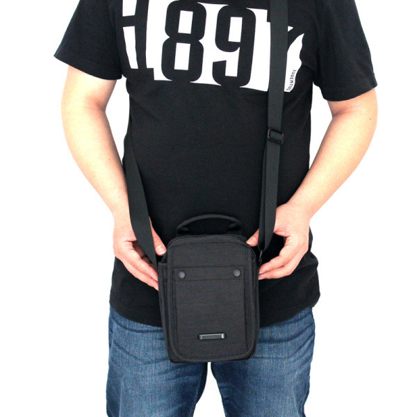 Moderna vīriešu soma ar tekstila rokturi