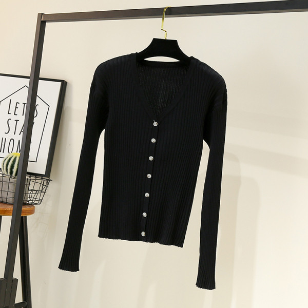 Sieviešu veste ar špica kakla izgriezumu un garām piedurknēm