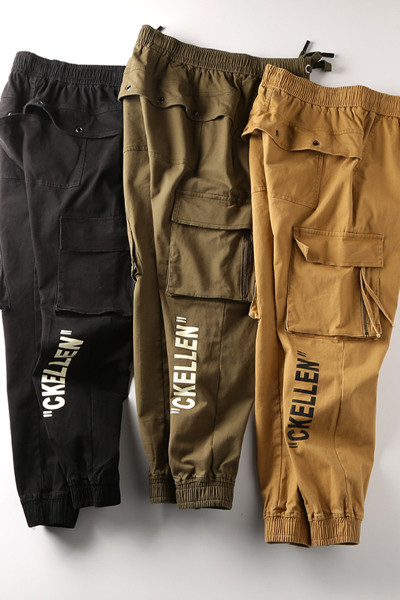 Taskute ja kirjaga vabaaja meeste püksid