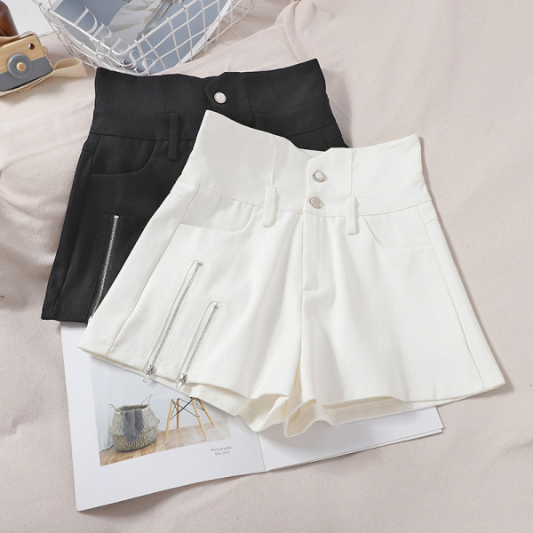 Moodsad kõrge vöökoha ja lukuelemendiga naistepüksid