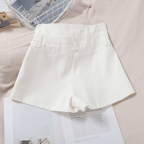 Moodsad kõrge vöökoha ja lukuelemendiga naistepüksid