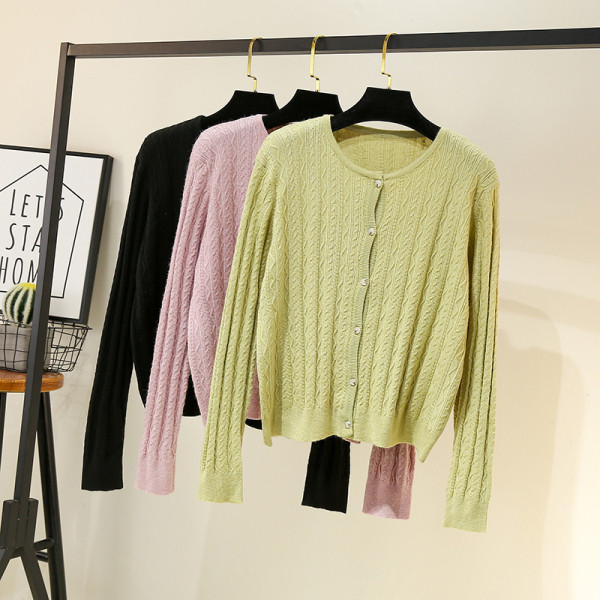 Moderna sieviešu veste ar apaļu kakla izgriezumu