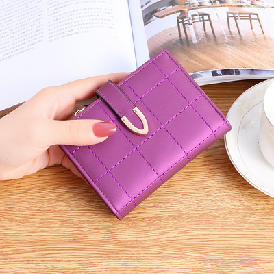 Γυναικείο πορτοφόλι με μεταλλική στερέωση από οικολογικό δέρμα