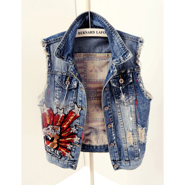 Moodne naiste teksavest aplikatsiooni ja rebenenud motiividega