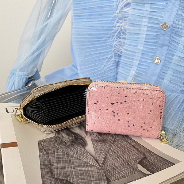 Γυναικείο πορτοφόλι με γυαλιστερά σωματίδια και κλείσιμο με φερμουάρ