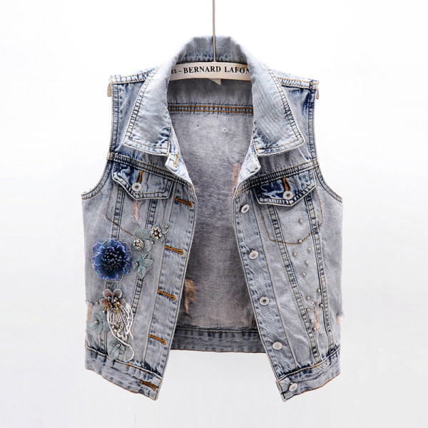 Κομψό γυναικείο γιλέκο με τζιν με απλικέ και τρισδιάστατο στοιχείο