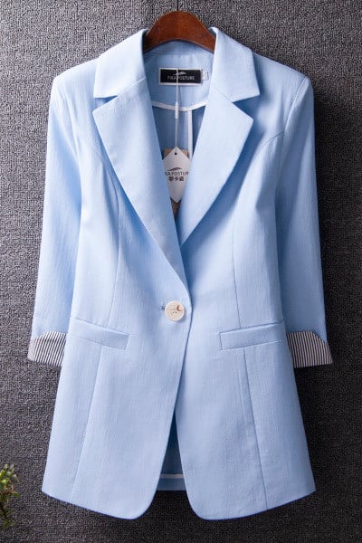 Hosszú illeszkedő kabát zsebekkel