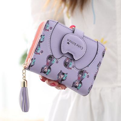 Női pénztárca bojttal és színes rátéttel