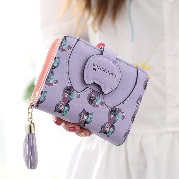 Női pénztárca bojttal és színes rátéttel