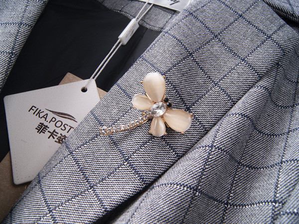 Λεπτό μοντέλο καρό σακάκι με κουμπί και τσέπες