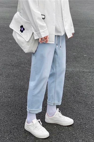 Meeste moodne teksapükste sirge paeltega mudel