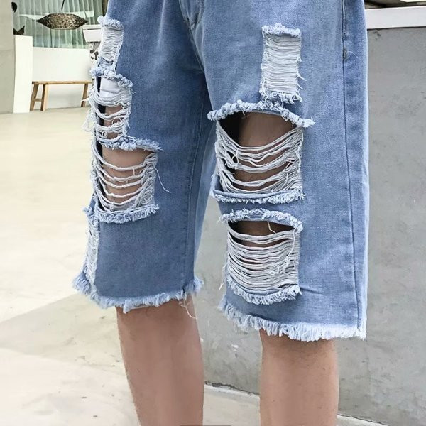 Blugi barbati moderni cu model 3/4 rupt dreapta