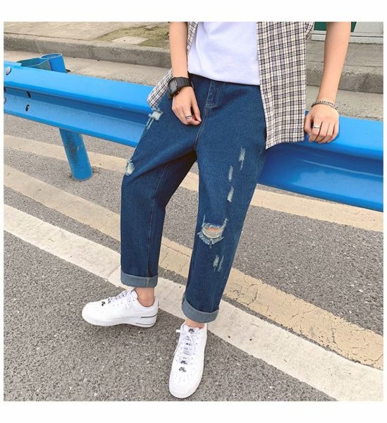 Lezser férfi farmer, szakadt mintával