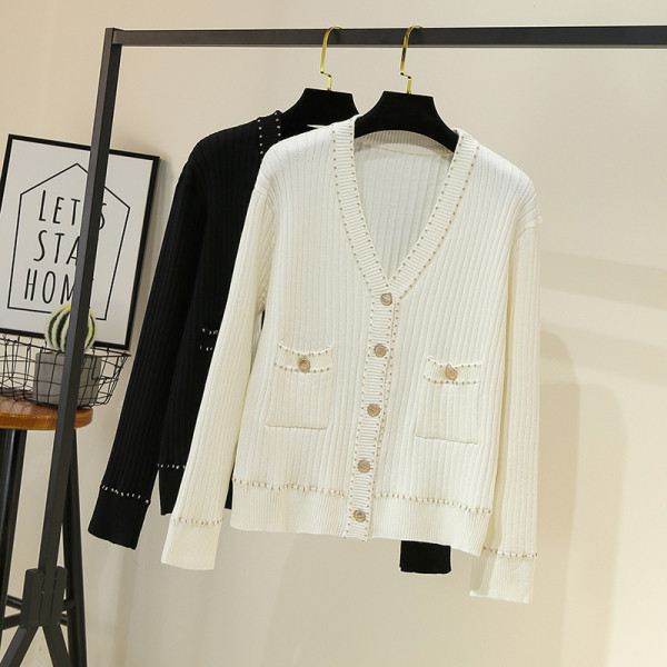 Moderna sieviešu veste ar špica kakla izgriezumu un kabatām