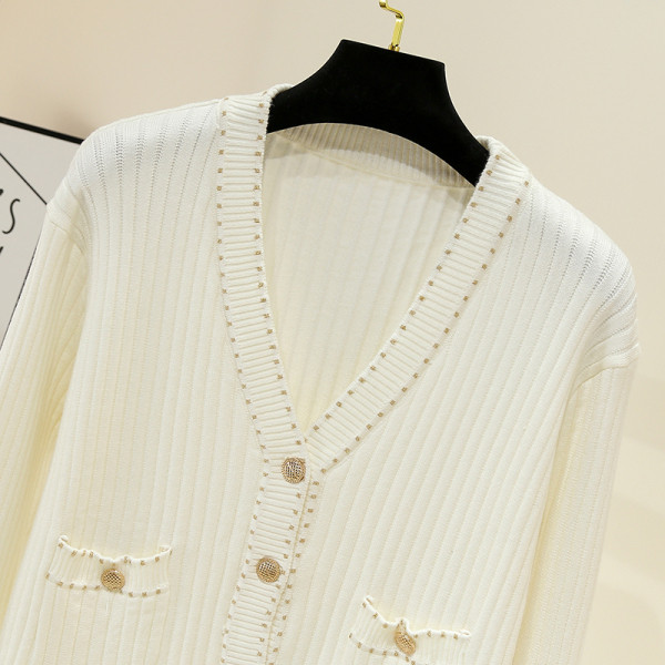 Moderna sieviešu veste ar špica kakla izgriezumu un kabatām