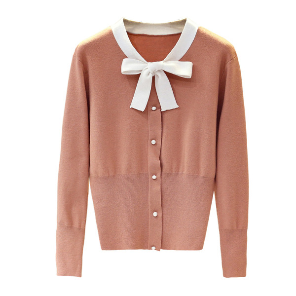 Moderna sieviešu veste - ar lentīti un pogām