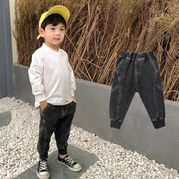 Μοντέρνα παιδικά μακριά τζιν με ελαστικό στον αστράγαλο και επιγραφή σε γκρι χρώμα