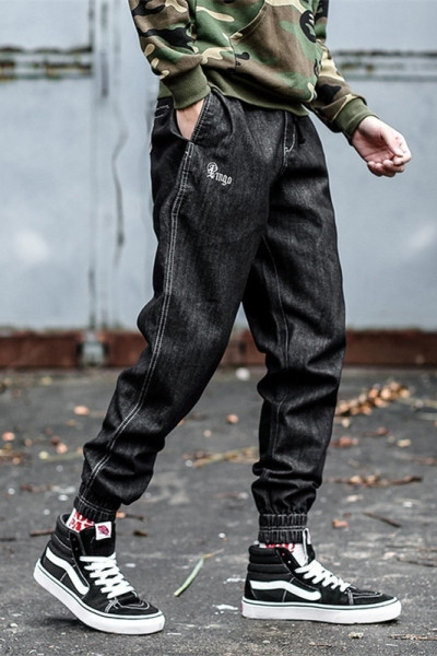 Meeste vabaaja teksad pahkluu taskute ja kummikutega