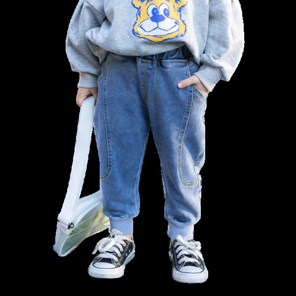 Modern, kék színű hosszú gyerekfarmer zsebbel és bokagumival