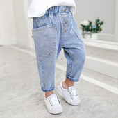 Modern hosszú farmernadrág, gombokkal és zsebekkel