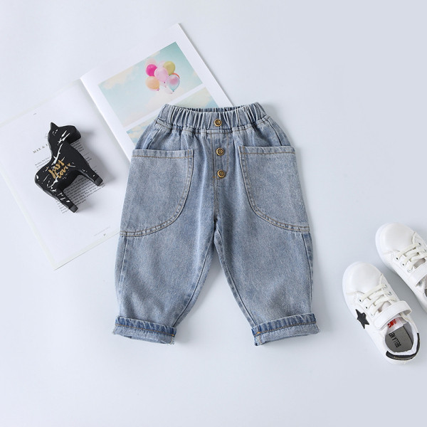 Modern hosszú farmernadrág, gombokkal és zsebekkel