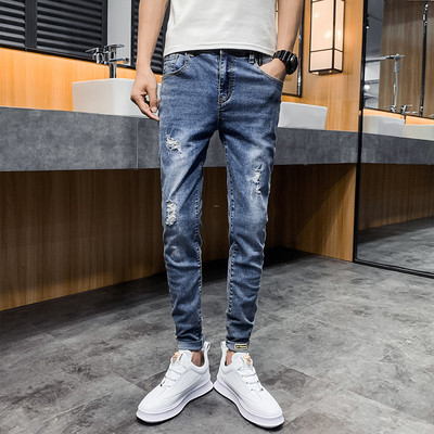 Casual meeste teksapükste sirge mudel taskutega ja rebenenud paremalt