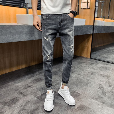 Casual meeste teksapükste sirge mudel taskutega ja rebenenud paremalt