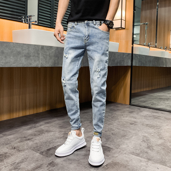 Casual meeste teksapükste sirge mudel taskutega ja rebenenud paremalt