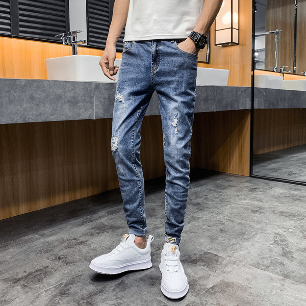 Casual meeste teksapükste sirge mudel taskutega ja rebenenud paremalt