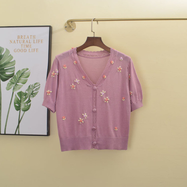 Naiste vest spitsikaelusega ja lühikeste varrukatega