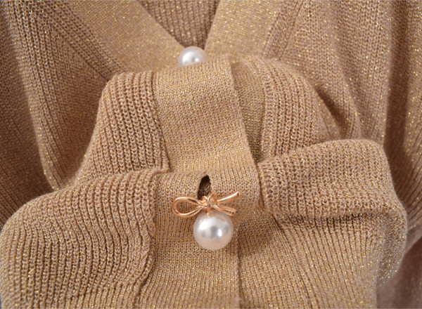 Sieviešu veste ar V veida izgriezumu un spīdīgu efektu