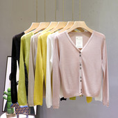 Hétköznapi női mellény hosszú ujjal és spitz nyakkivágással