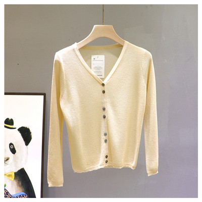 Hétköznapi női mellény hosszú ujjal és spitz nyakkivágással