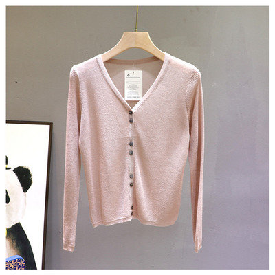 Hétköznapi női mellény hosszú ujjal és spitz nyakkivágással